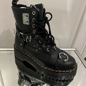 Brand new Dr. Martin. Never worn boxes included.